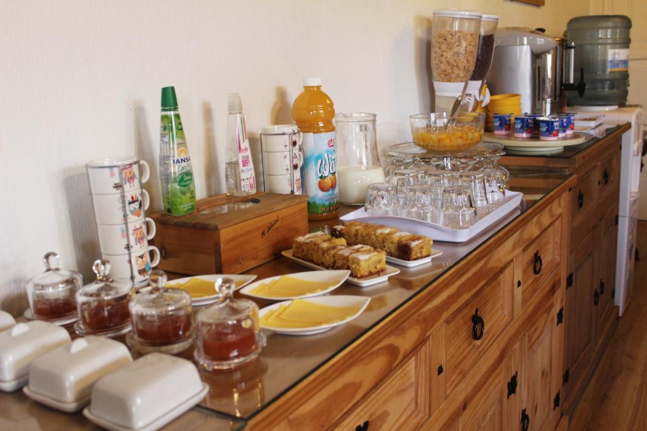 Hostal Y Cabanas Ainil بونتا أريناس المظهر الخارجي الصورة